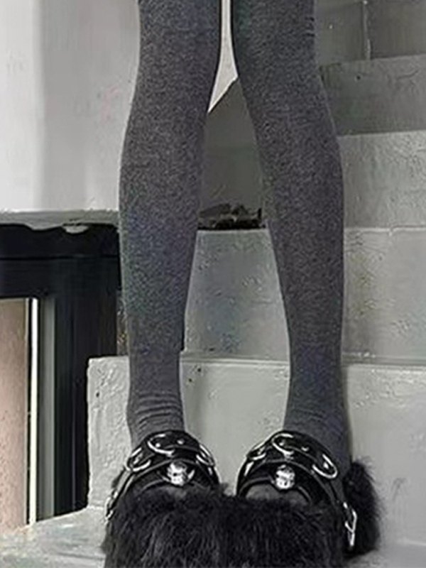 Oberschenkelhohe Socken mit Cartoon-Muster